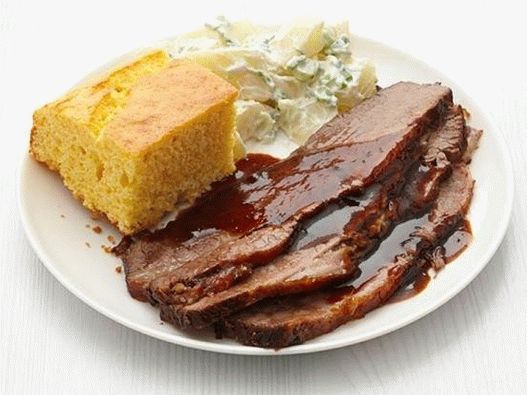 Фотографија од говедско месо од говедско месо во сос со скара со скара за готвење