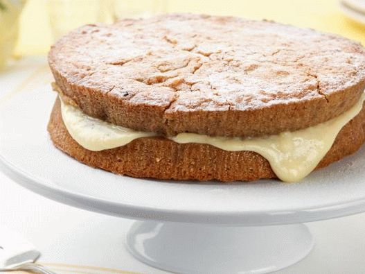 Фотографија од торта колачиња со пудинг за банана